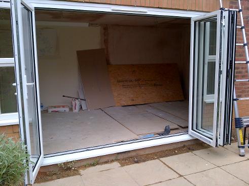 white aluminium bi-folding doors